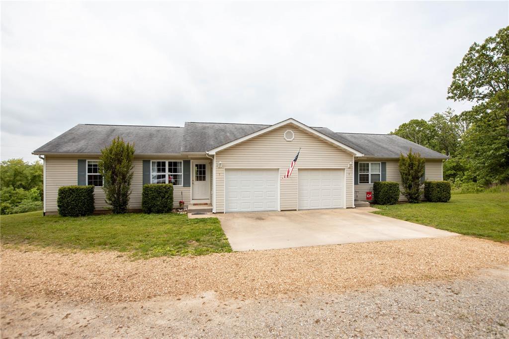 Property Photo:  1604 Lindberg 1-4  MO 65453 