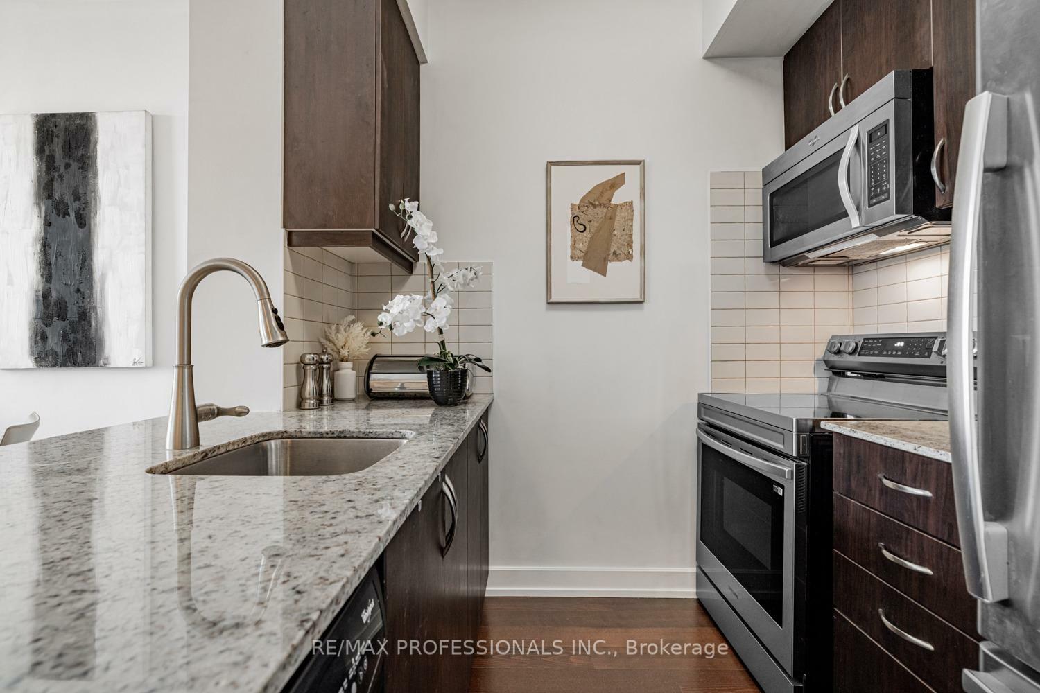Property Photo: 6 Eva Road 205 ON M9C 0B1