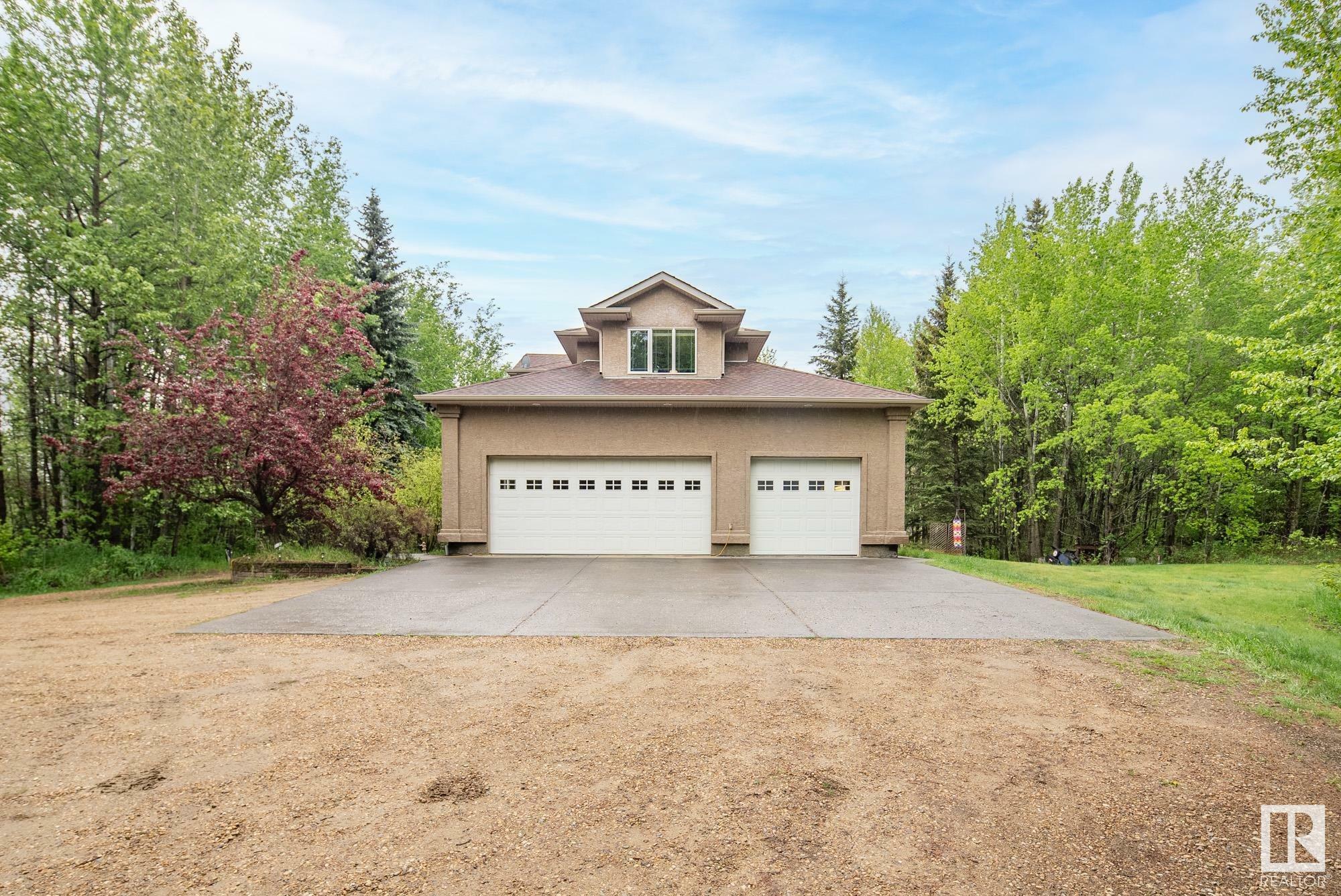 Property Photo: 26516 Twp Road 514 32 AB T7Y 1E9