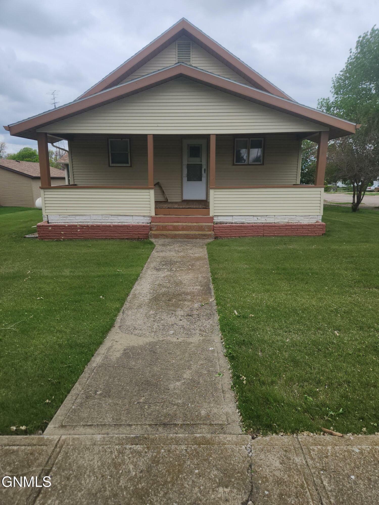 Property Photo:  214 3rd Avenue E  ND 58562 