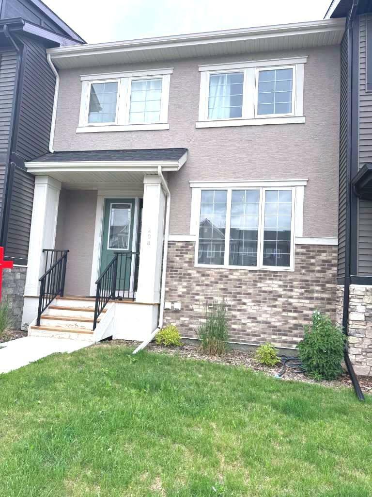 Property Photo:  208 Waterford Boulevard  AB T1X 2M8 