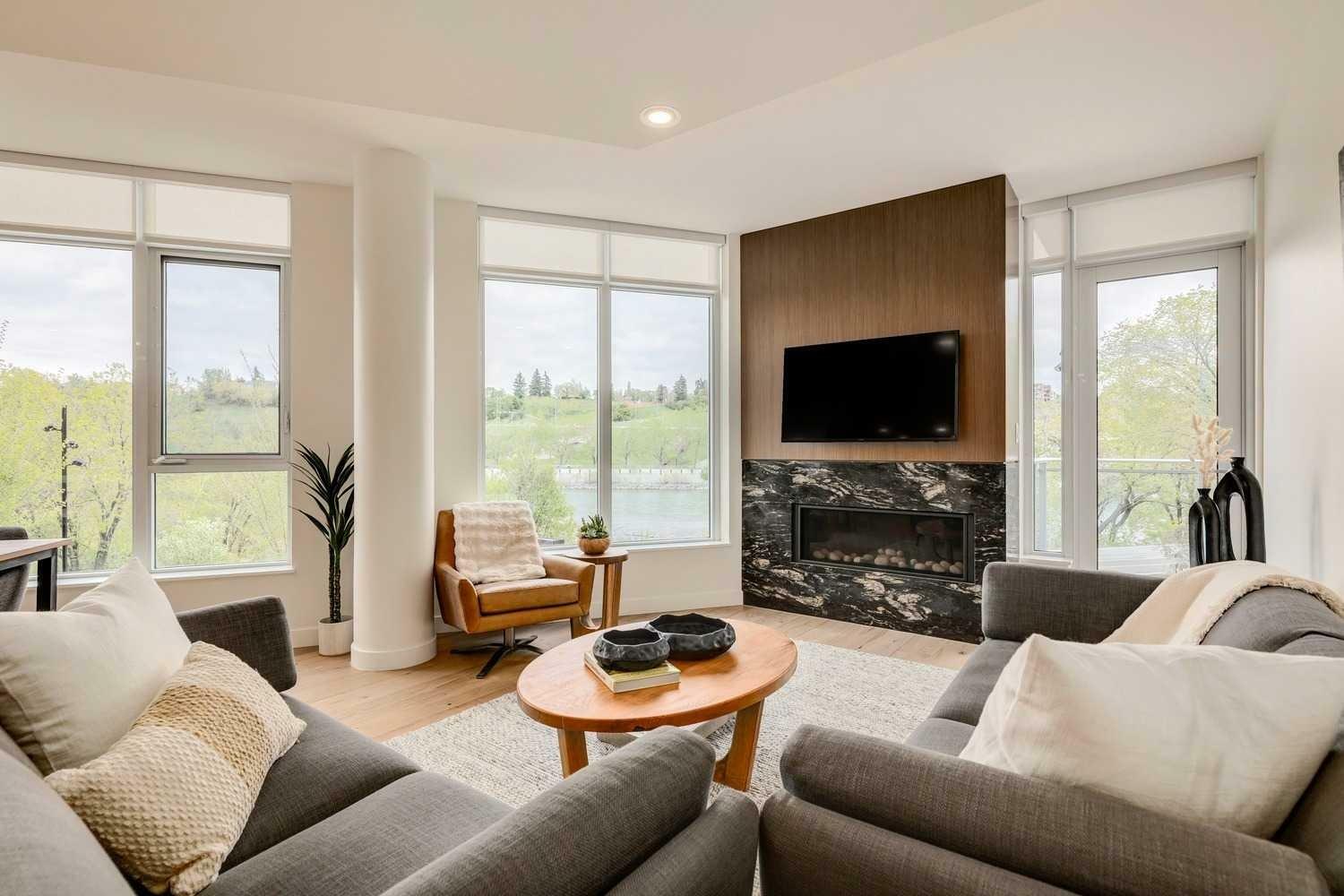 Property Photo: 128 Waterfront Court SW 202 AB T2P 1K9