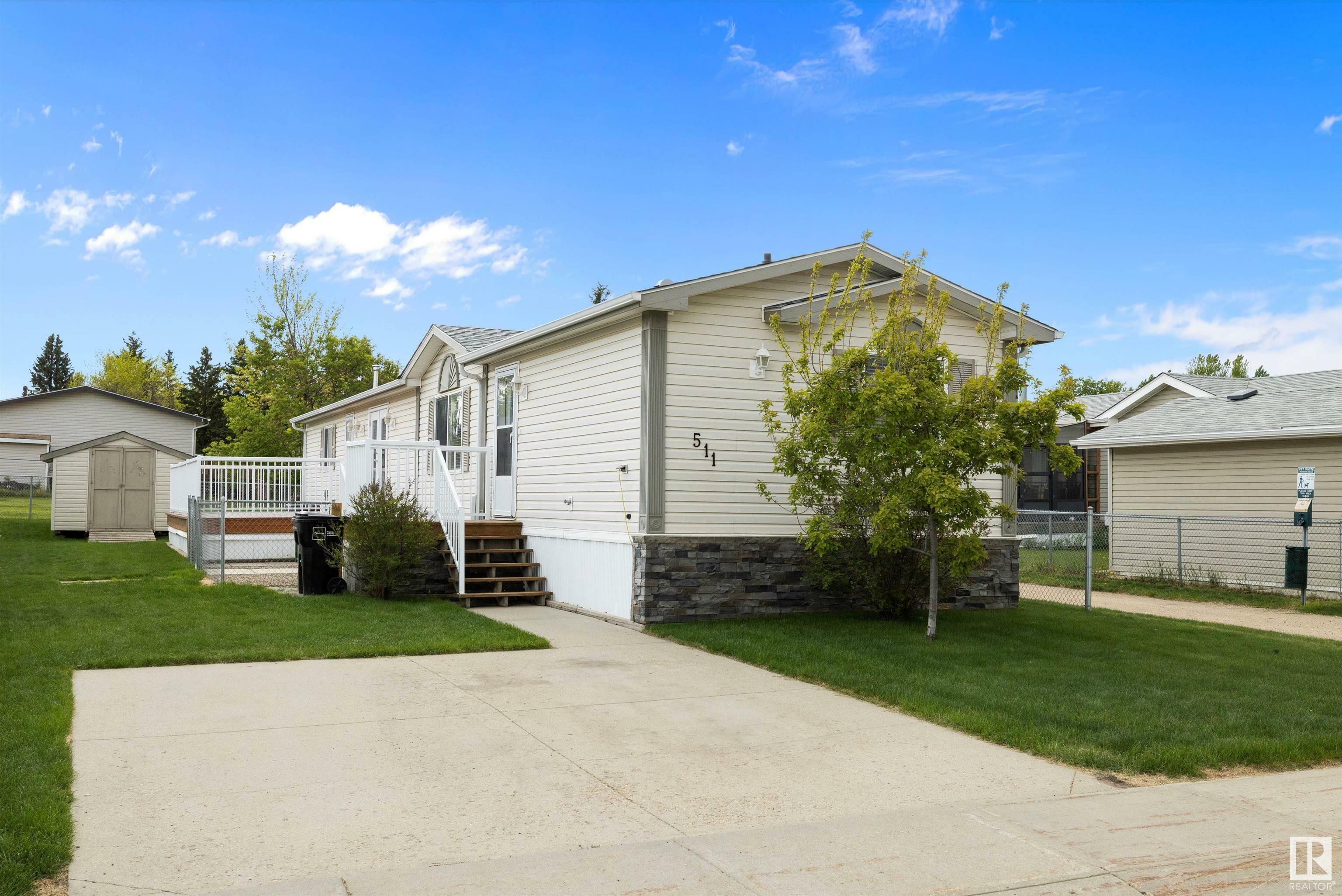 Property Photo: 511 Maple Wood Crescent NW AB T6P 0B1