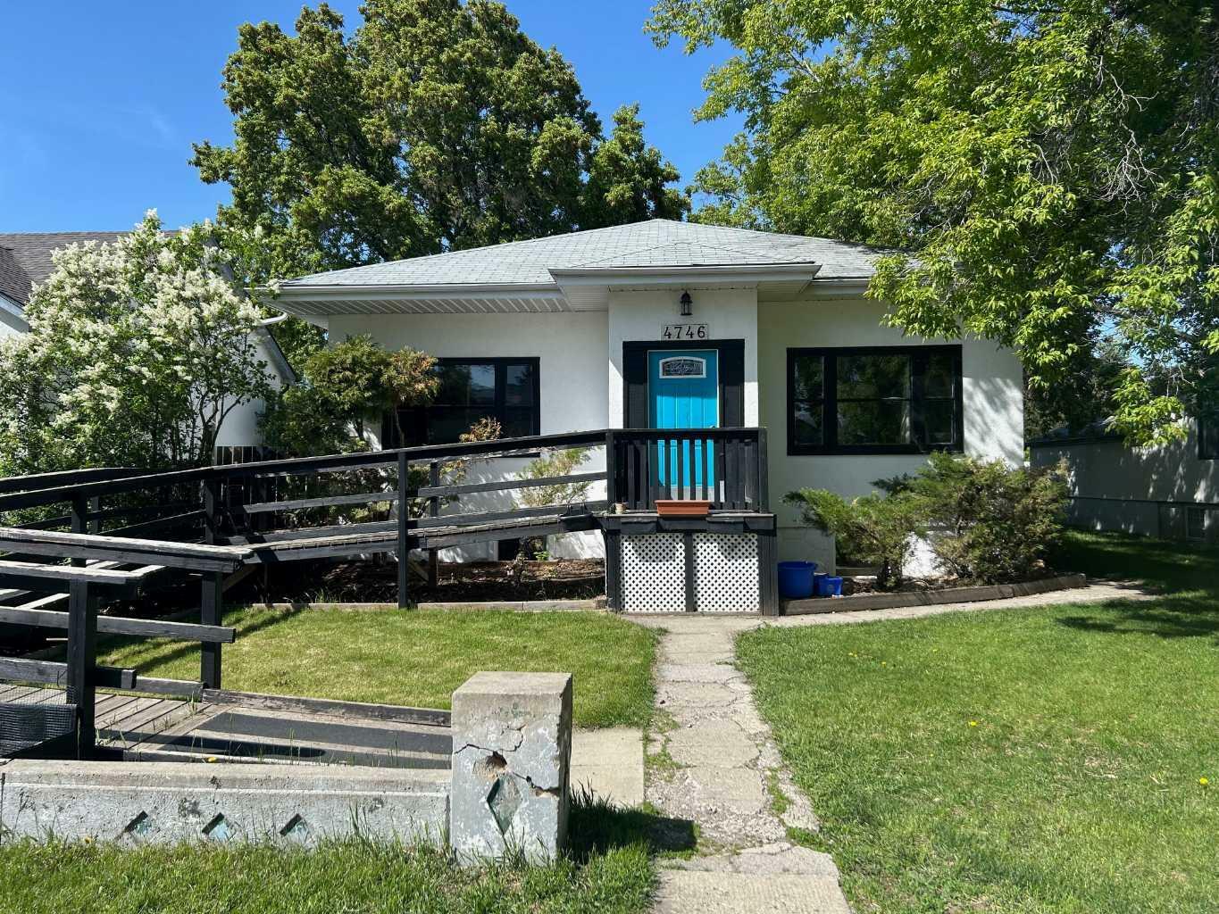 Property Photo: 4746 53 Street AB T4R 2S7