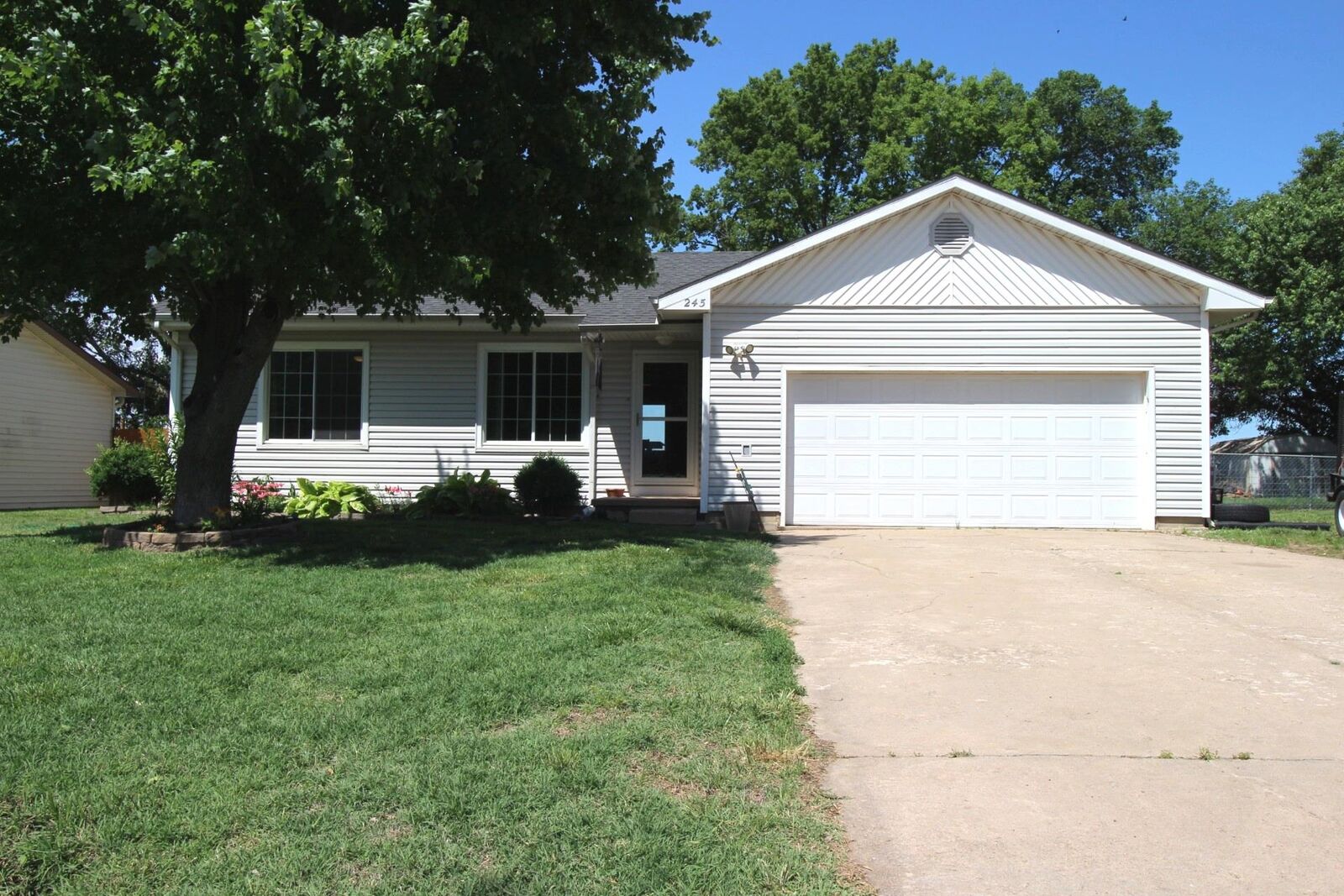 Property Photo:  245 N Grain St  KS 67026