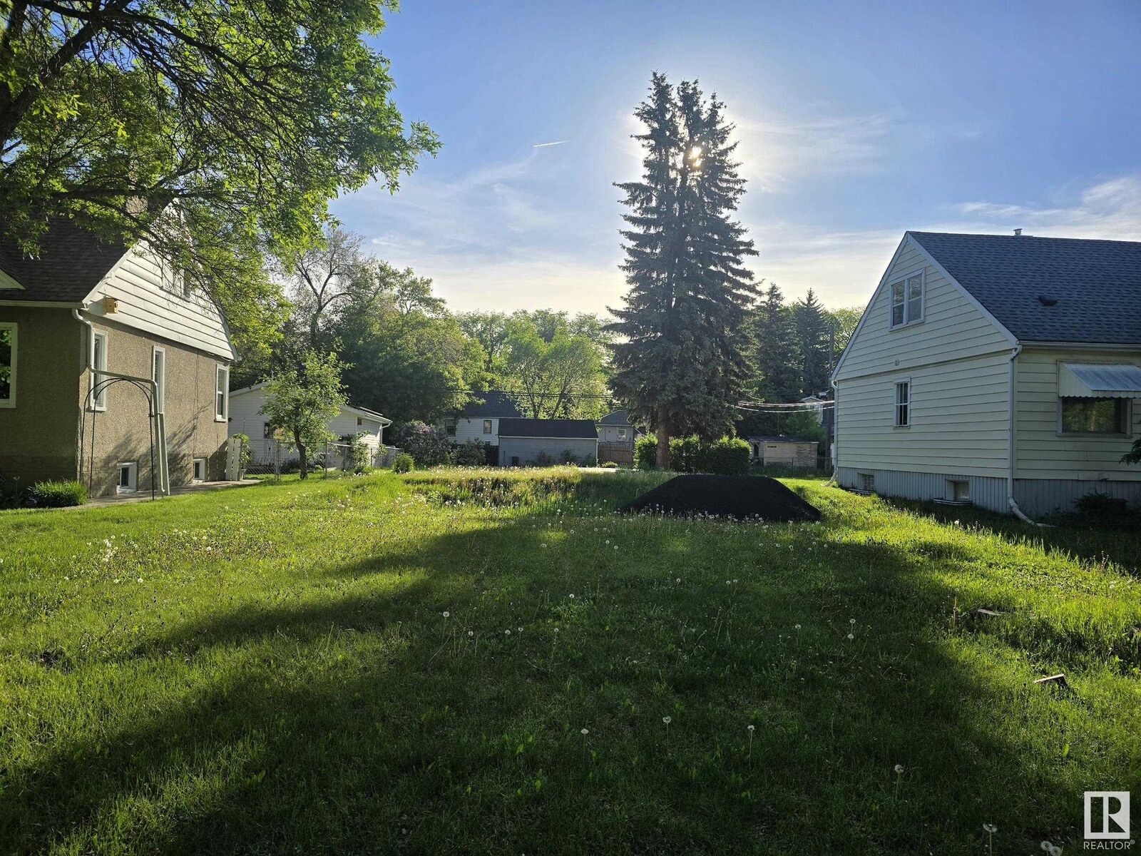 Property Photo:  11645 St Albert Trail NW  AB T5M 3L6 