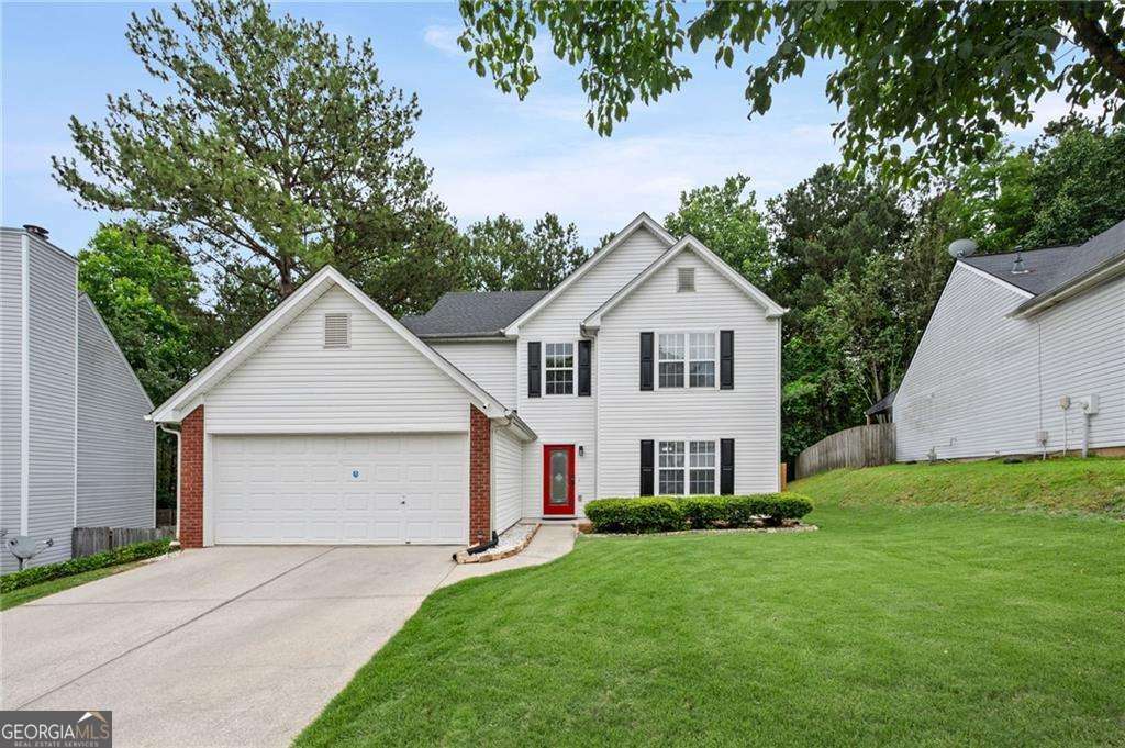 Property Photo: 1047 Woodsong Pass Court GA 30043