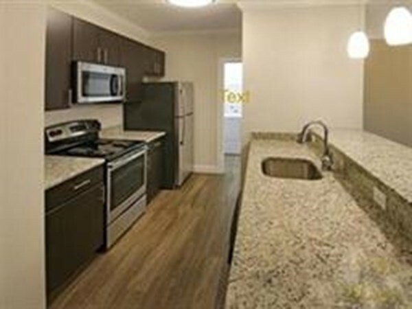 Property Photo: 244 Washington Street 1-105 MA 02356