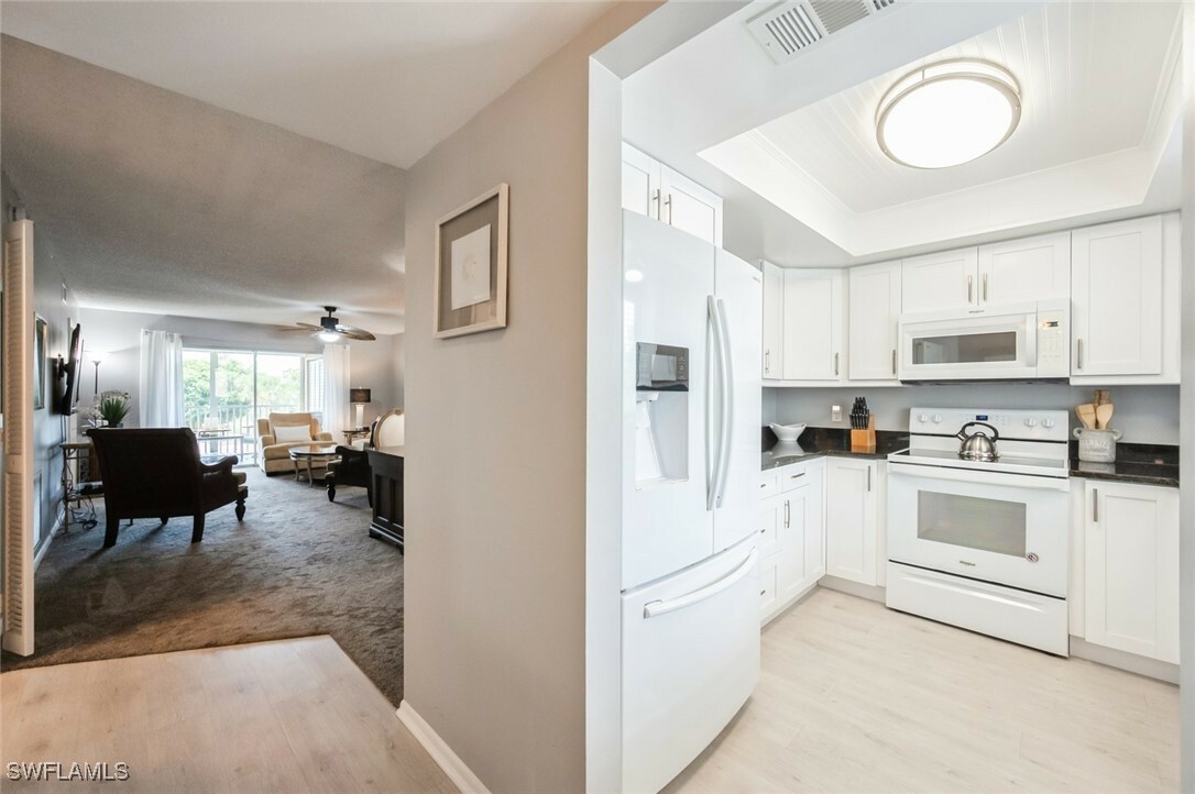 Property Photo:  5651 Rattlesnake Hammock Road C-201  FL 34113 