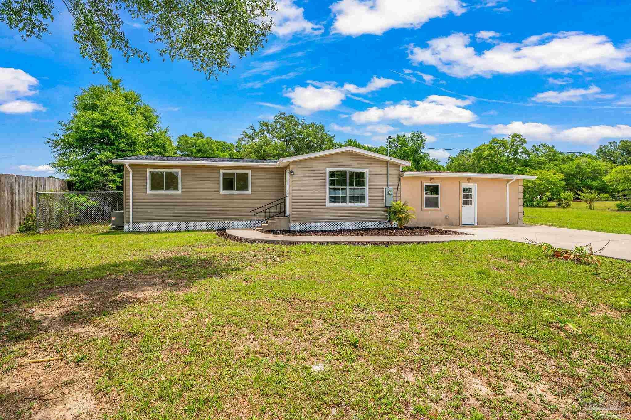 Property Photo: 6998 Cosmos St FL 32570