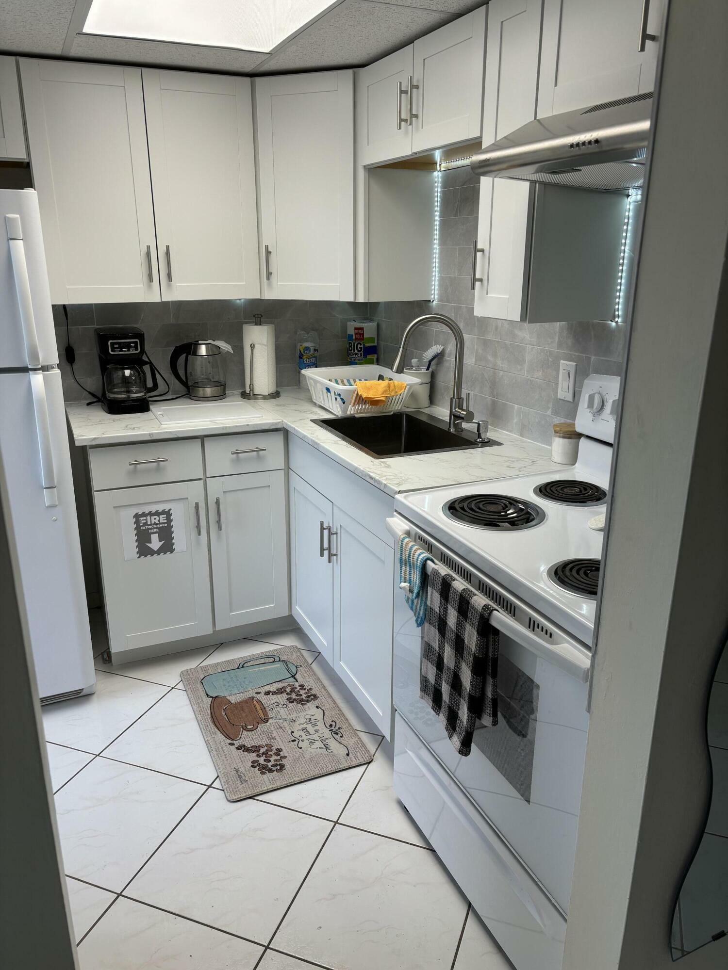Property Photo: 2191 NE 1st Court 103 FL 33435