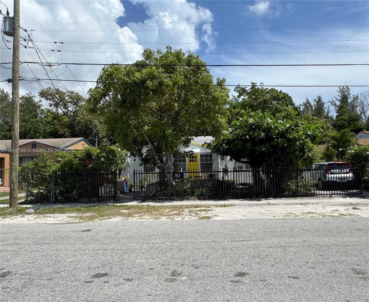 Property Photo:  151 NW 64th St  FL 33150 