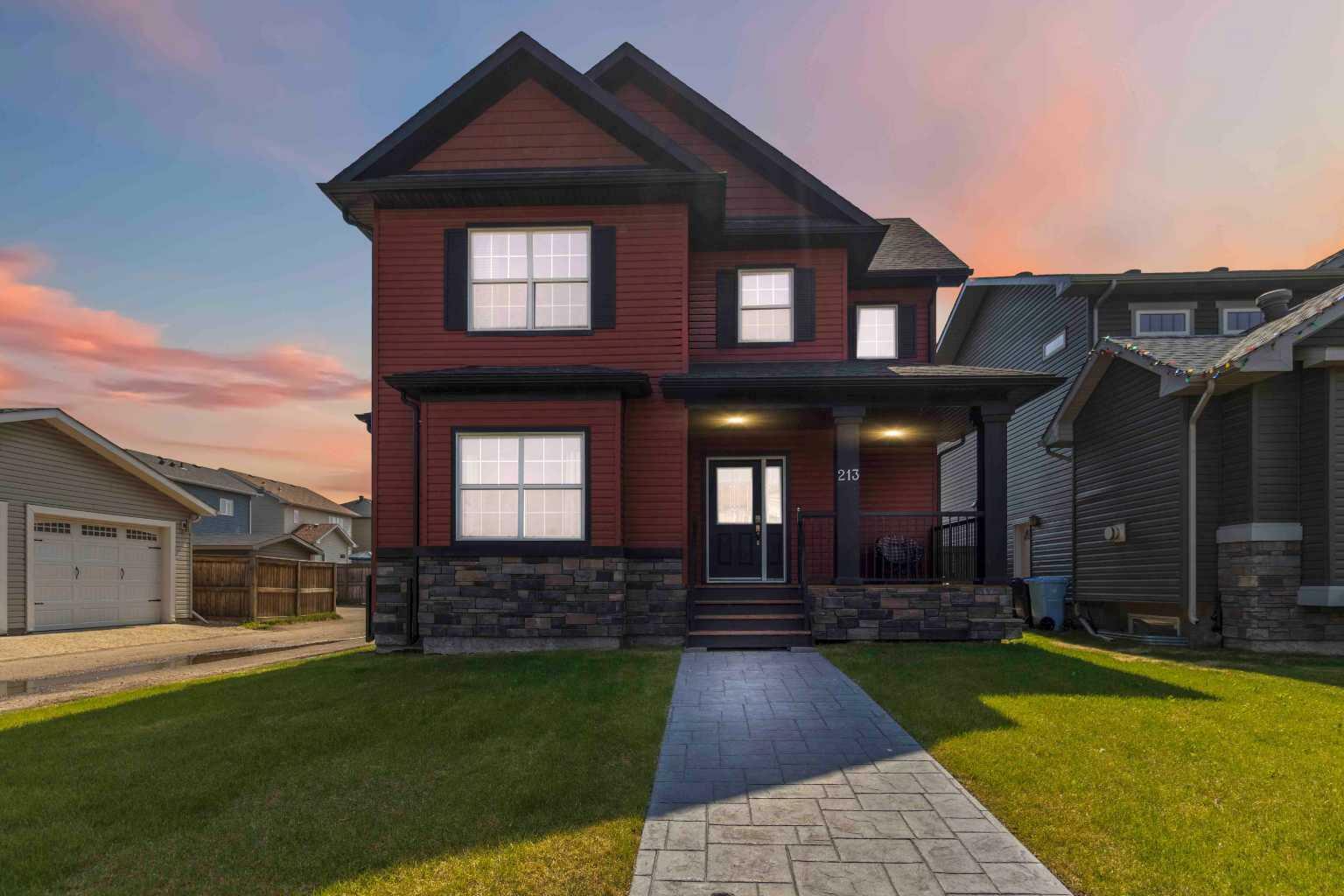 Property Photo: 213 Snowy Owl Way AB T9K 0R8