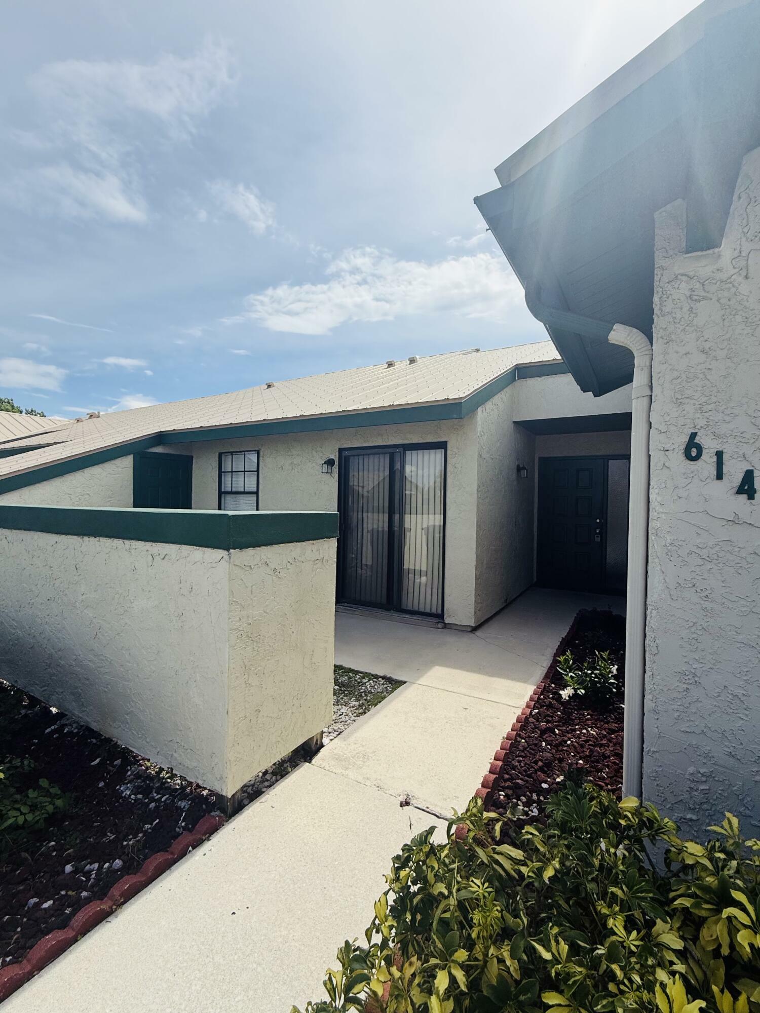 Property Photo: 614 SW Jeanne Street FL 34953