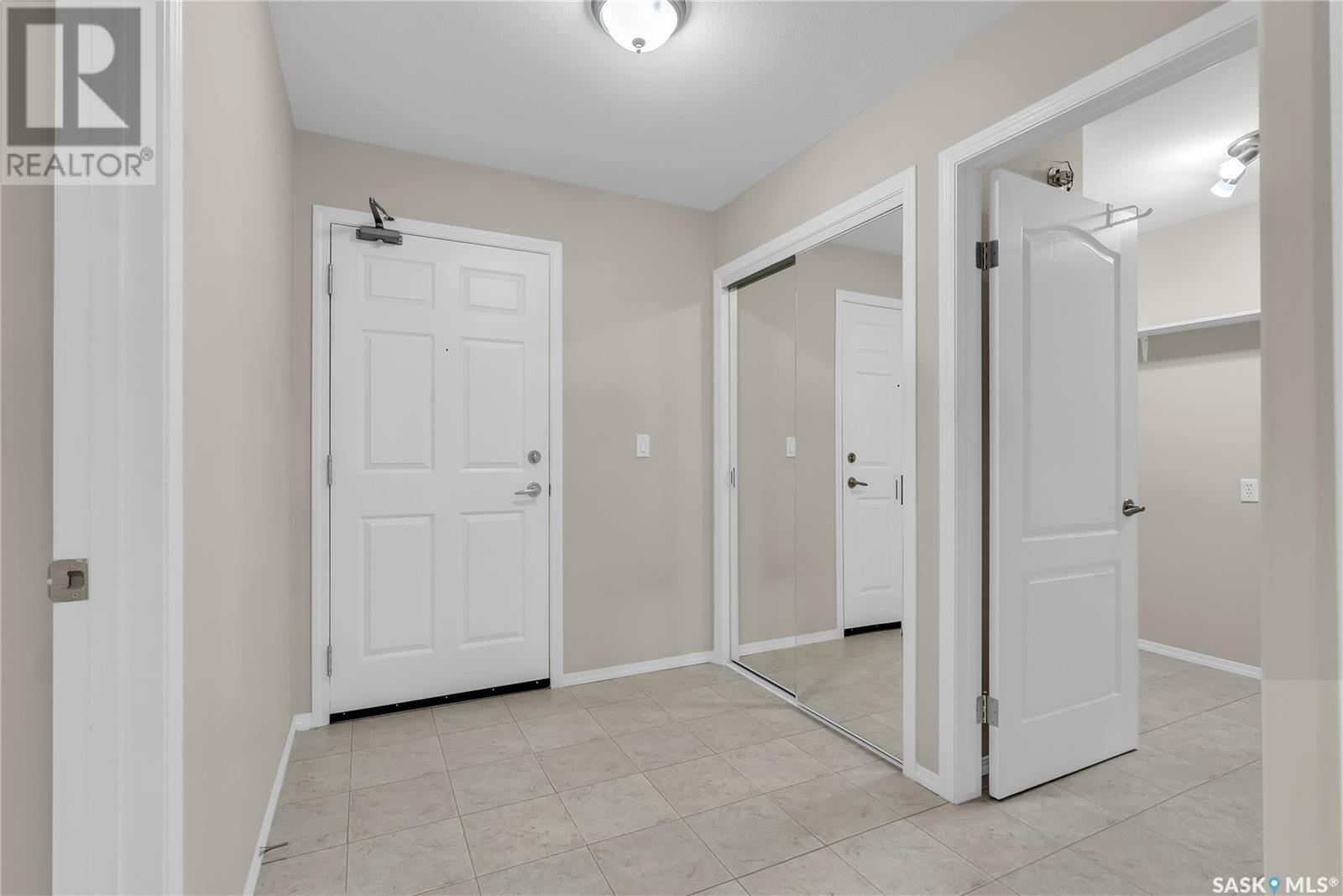 Property Photo:  102 230 Heath Avenue  SK S7S 1N7 