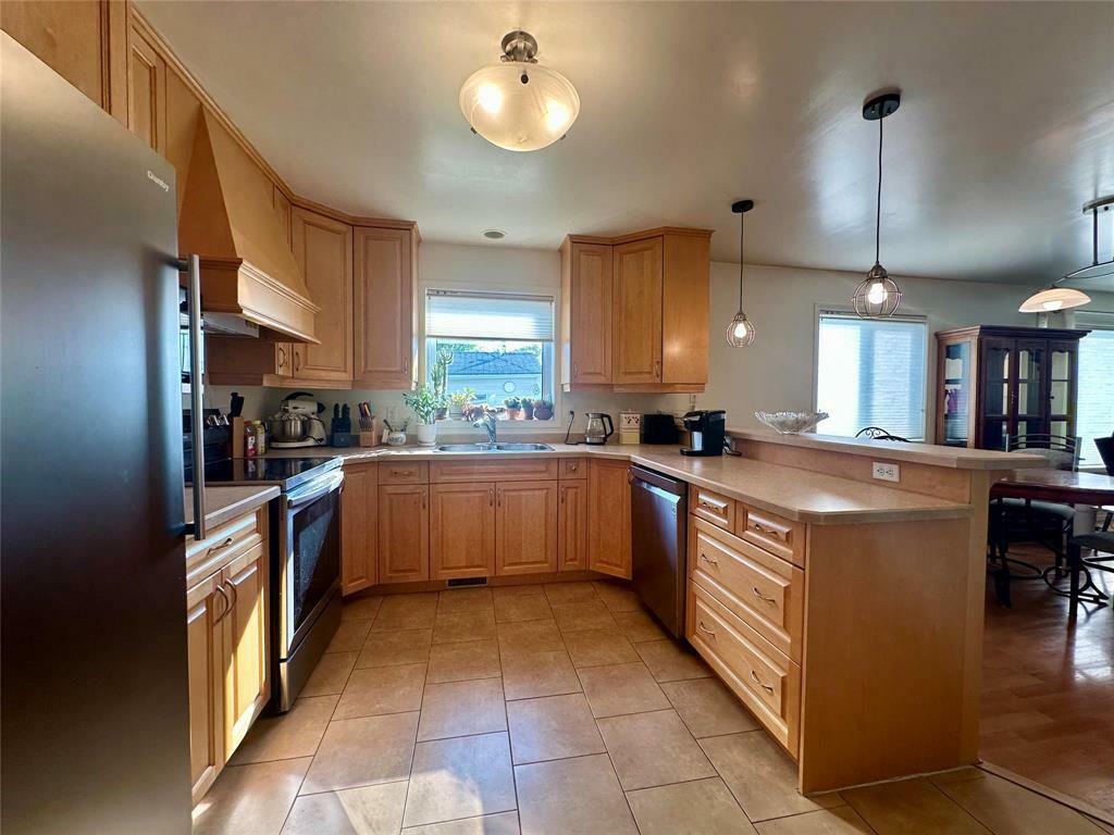 Property Photo: 212 Patrick Avenue MB R9A 1S6