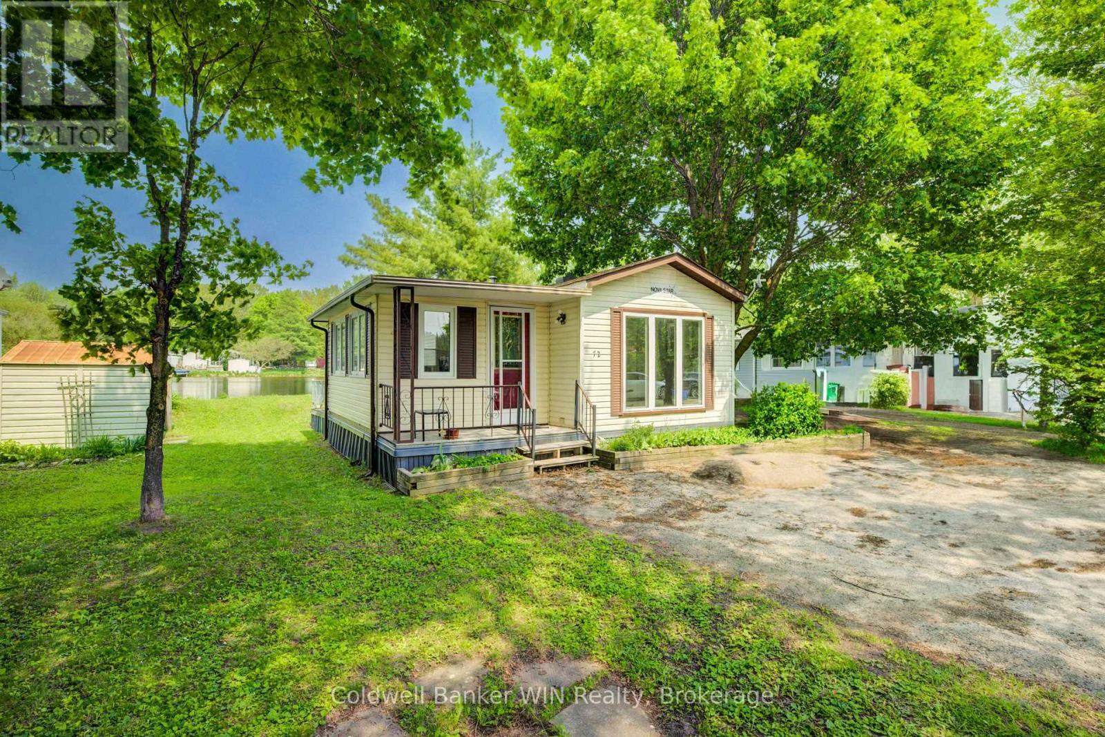 Property Photo: 72 Lakeside, 7489 Side Road 5 E ON N0G 2L0