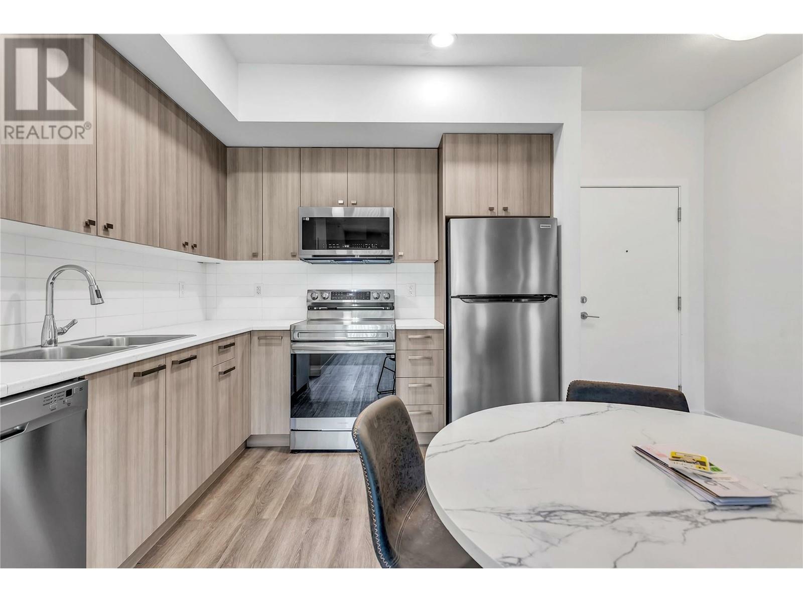 Property Photo: 935 Academy Way 322 BC V1V 3C9