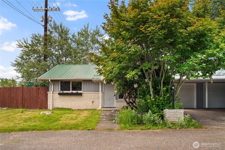 Property Photo:  16327  Smokey Point Blvd 1 & 2  WA 98271 