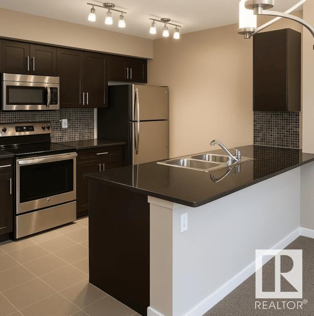 Property Photo: 5370 Chappelle Road SW 425 AB T6W 3L7