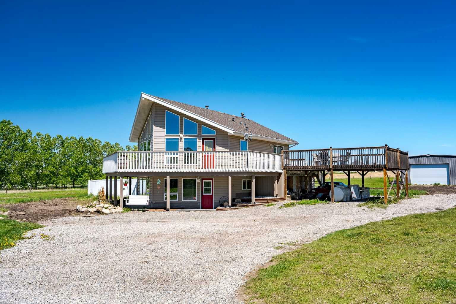 Property Photo: 434158 Clear Mountain Drive E AB T1S 1B6