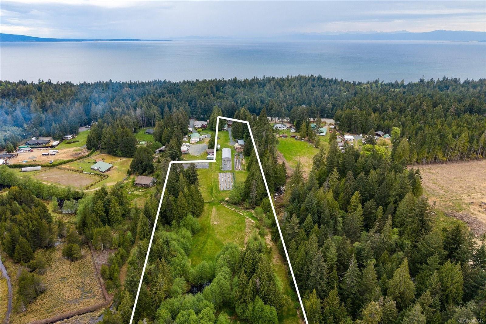 Property Photo: 4800 Island Hwy W BC V9K 1Y9