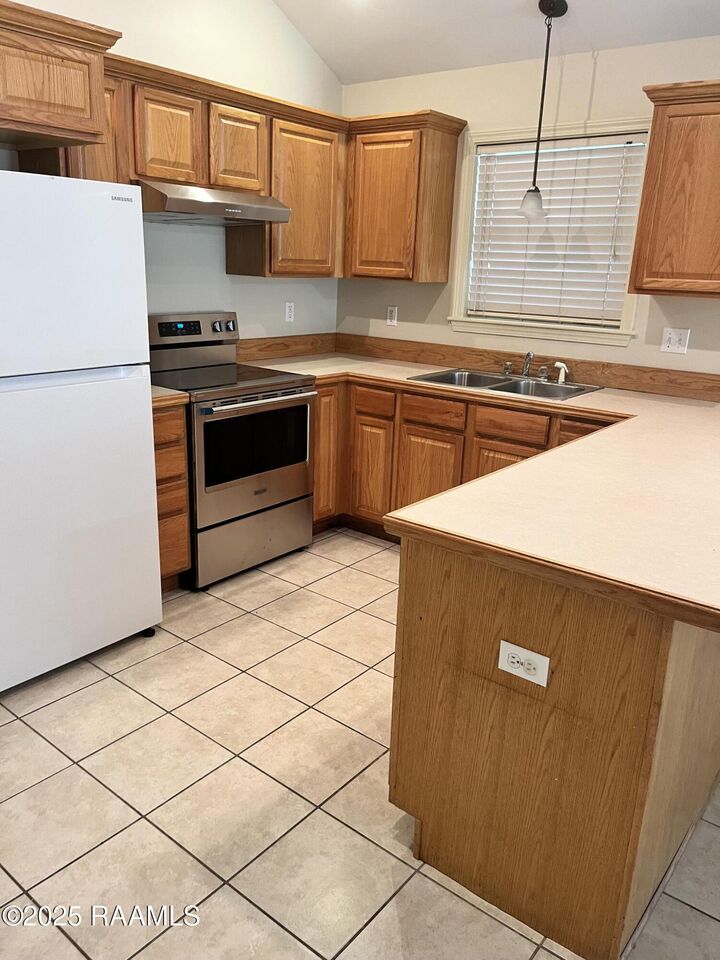 Property Photo:  405 Langley Drive  LA 70508 