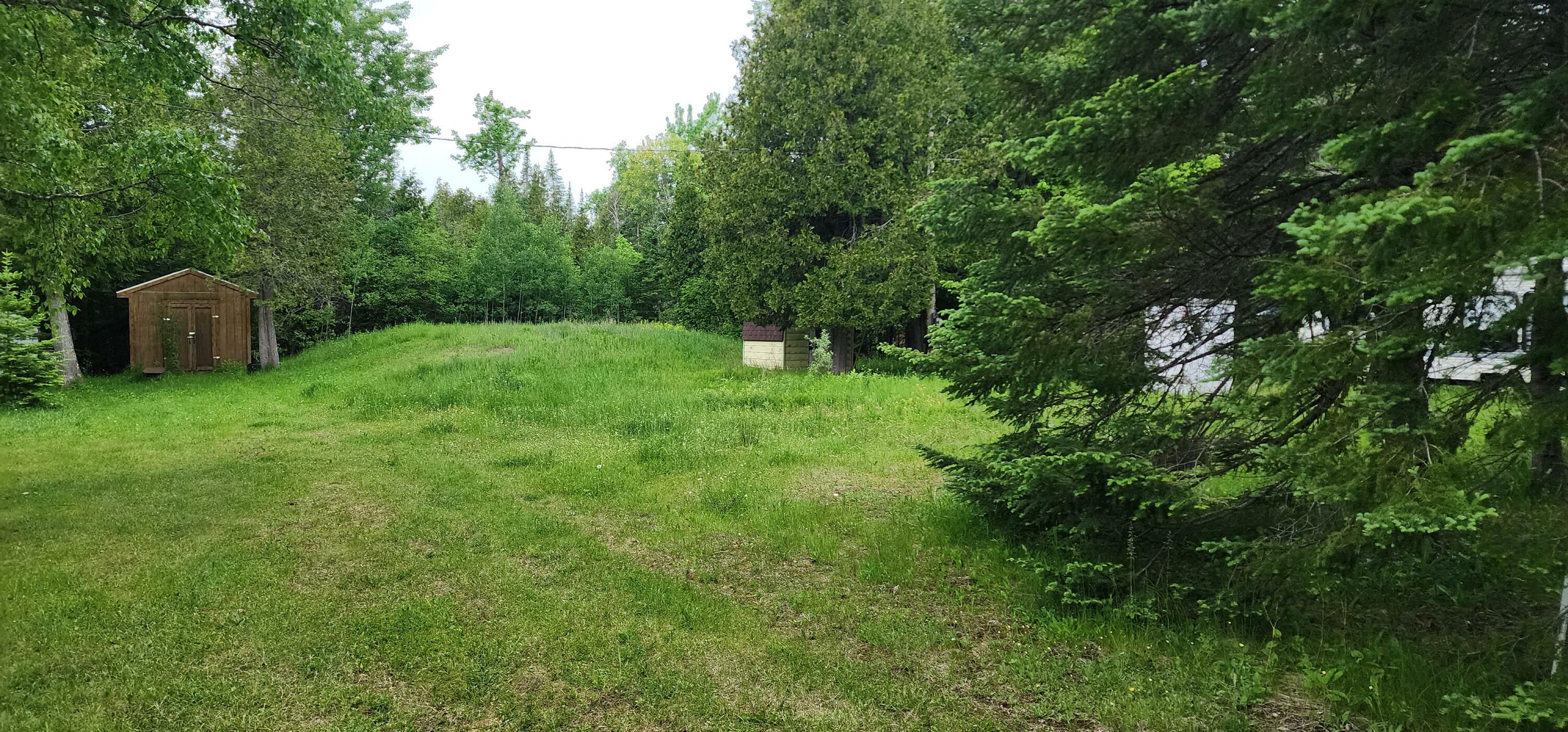 Property Photo: 26928 Point Aux Frenes Rd MI 49736
