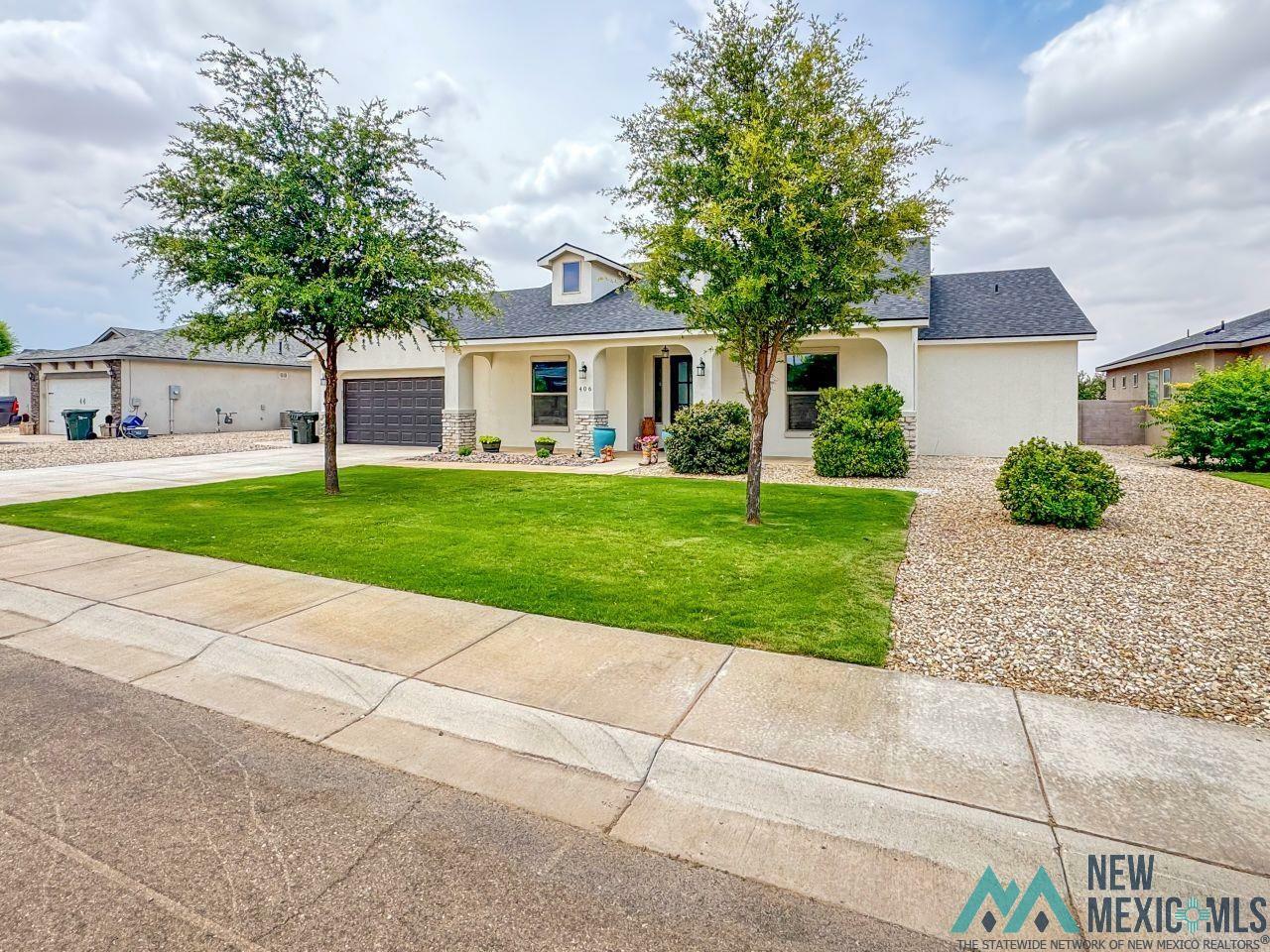 Property Photo: 406 Plantation Court NM 88220