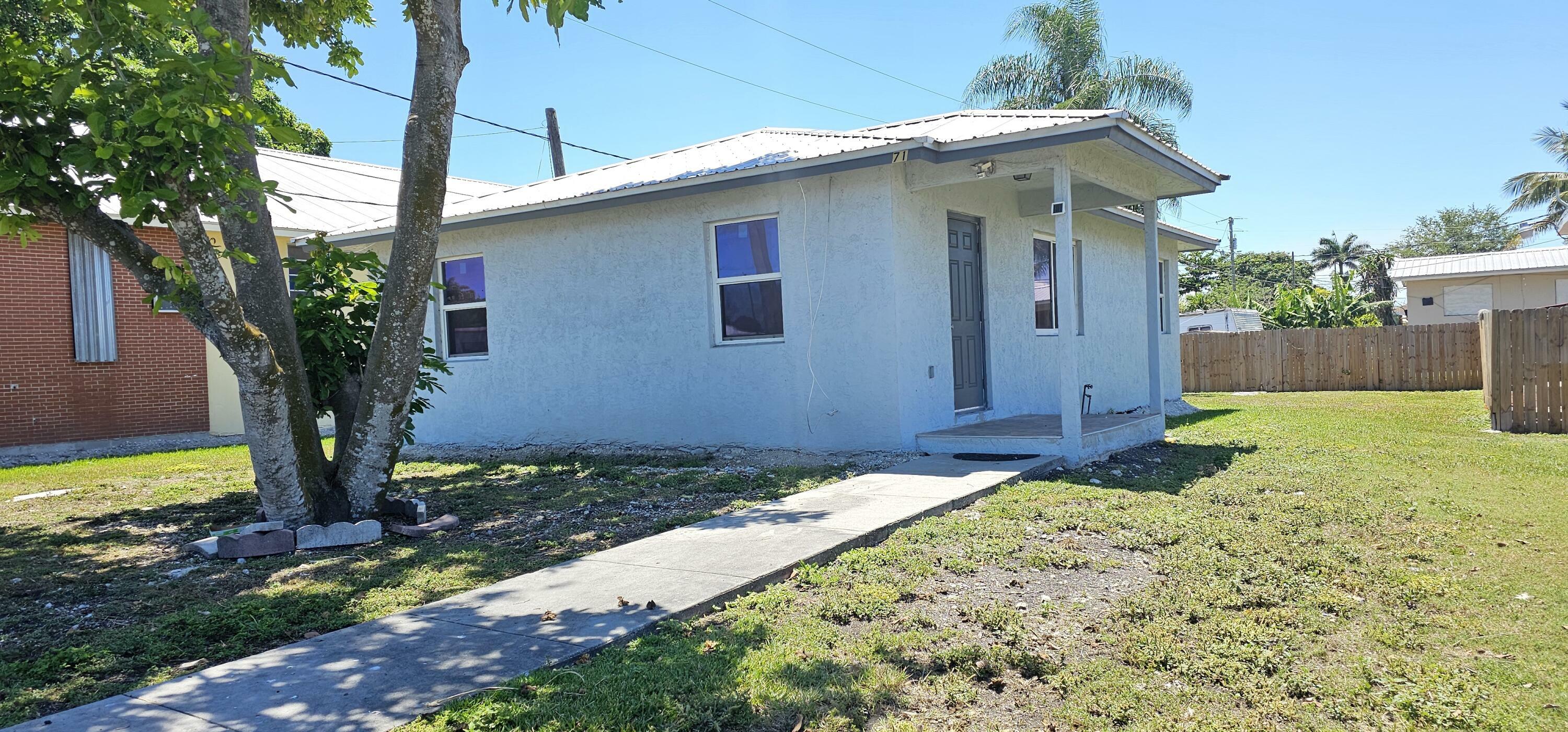 Property Photo: 716 NW 16th Street FL 33430