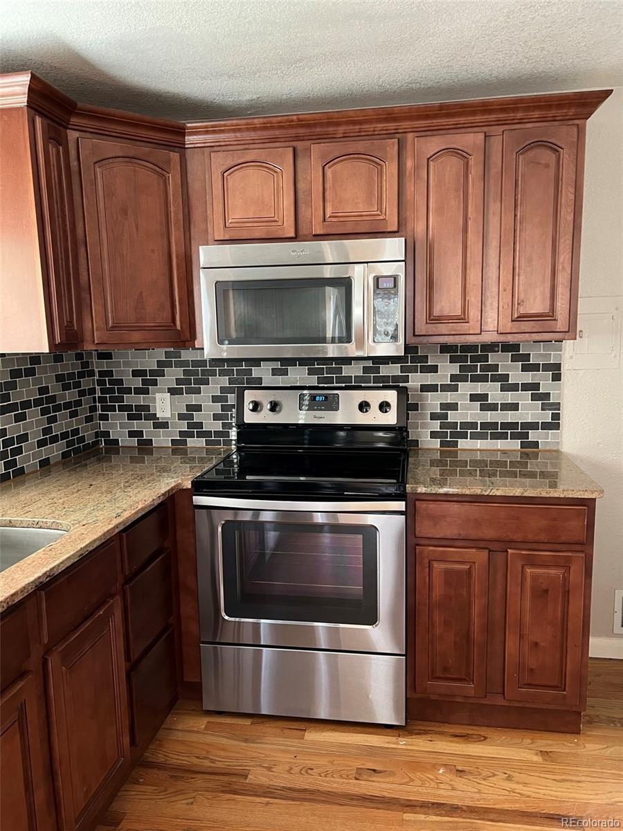 Property Photo: 1245 Yates Street CO 80204