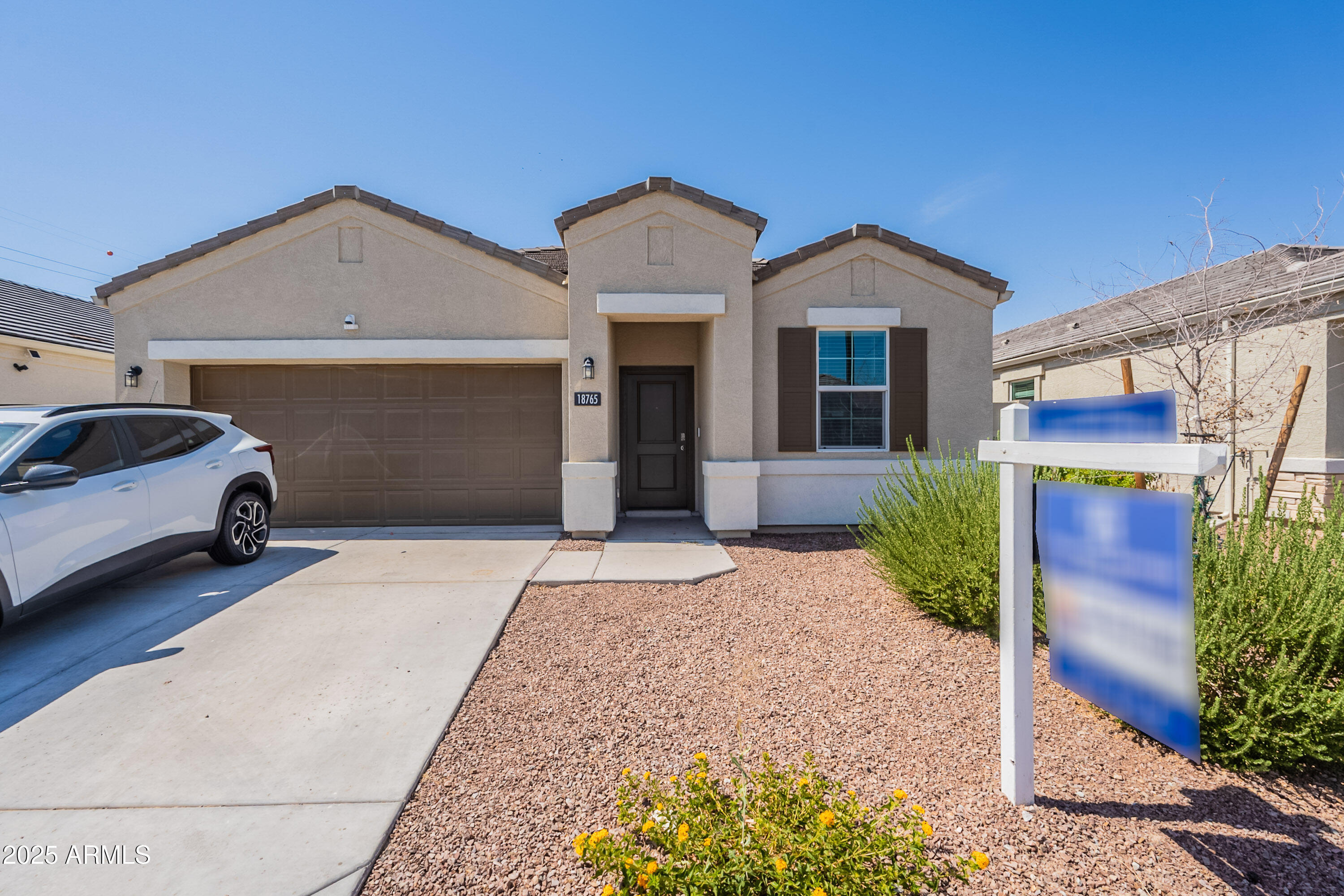 Property Photo: 18765 W Adams Street AZ 85326