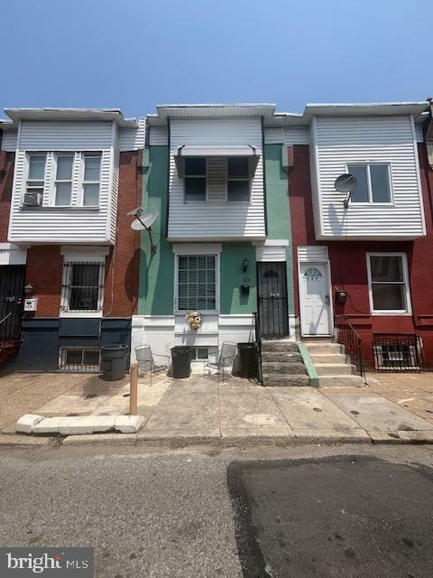Property Photo: 125 E Wishart Street PA 19134