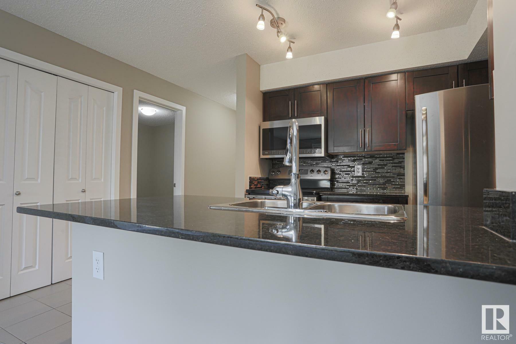Property Photo: 1070 McConachie Boulevard NW 312 AB T5Y 0X1