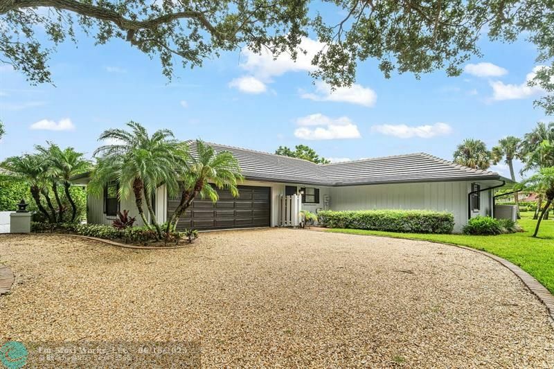 Property Photo:  10158 SE Acorn Way  FL 33469 
