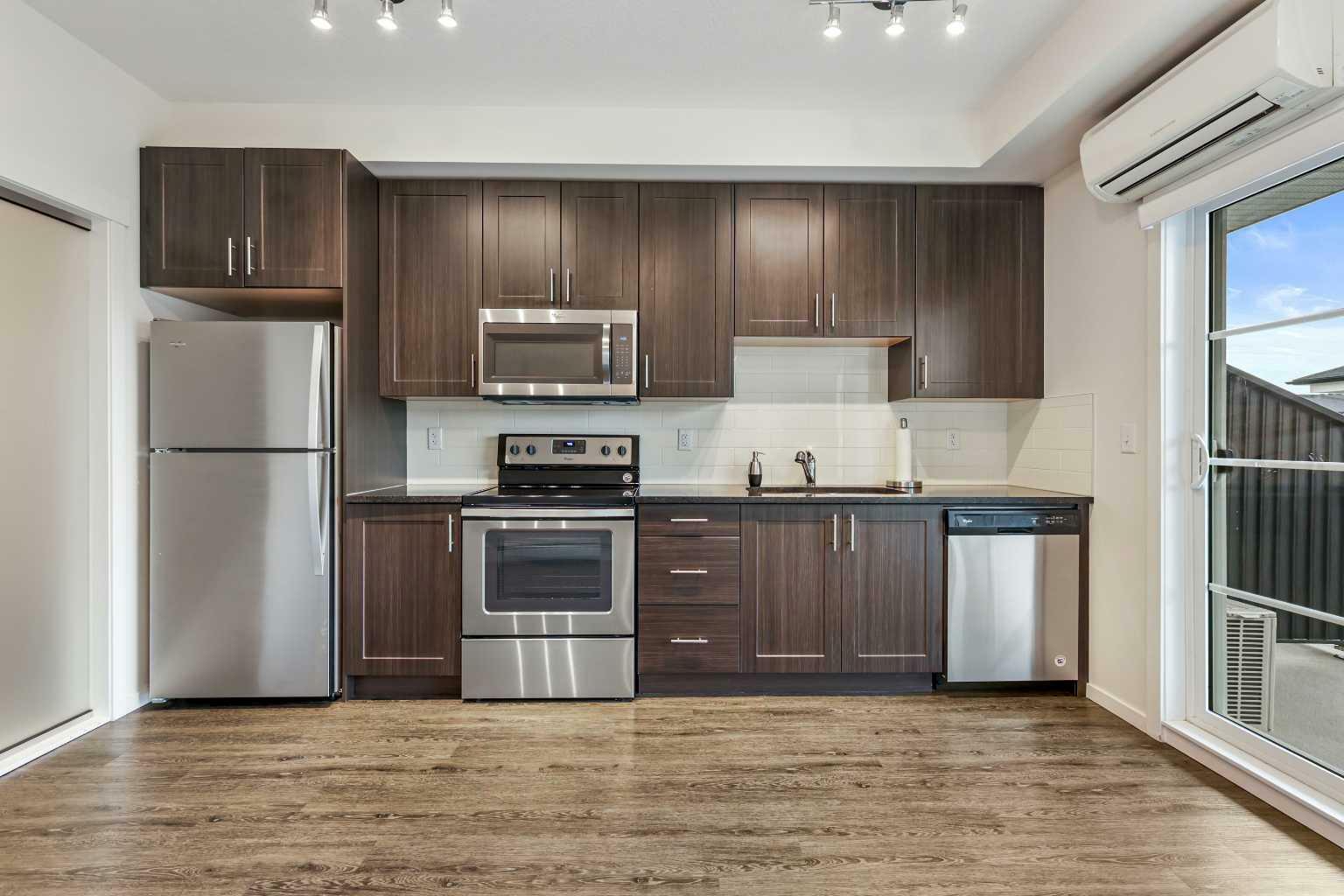 Property Photo: 215 Legacy Boulevard SE 2418 AB T2X 3Z5