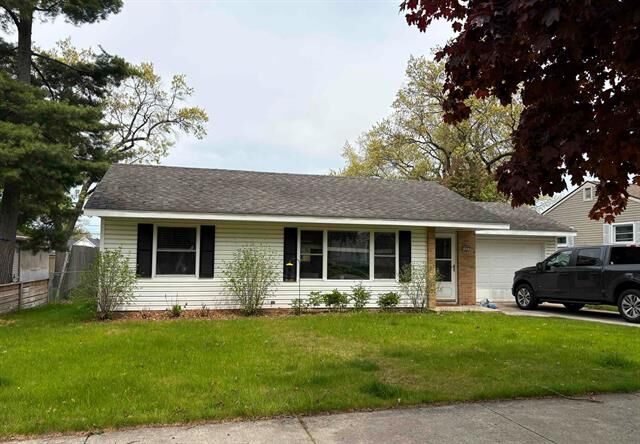 Property Photo:  1031 E State Street  MI 49686 