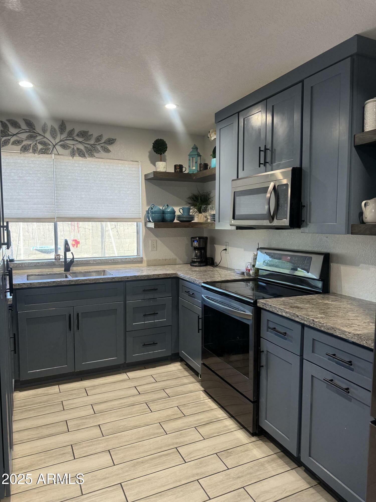Property Photo:  10436 W Ruth Avenue  AZ 85345 