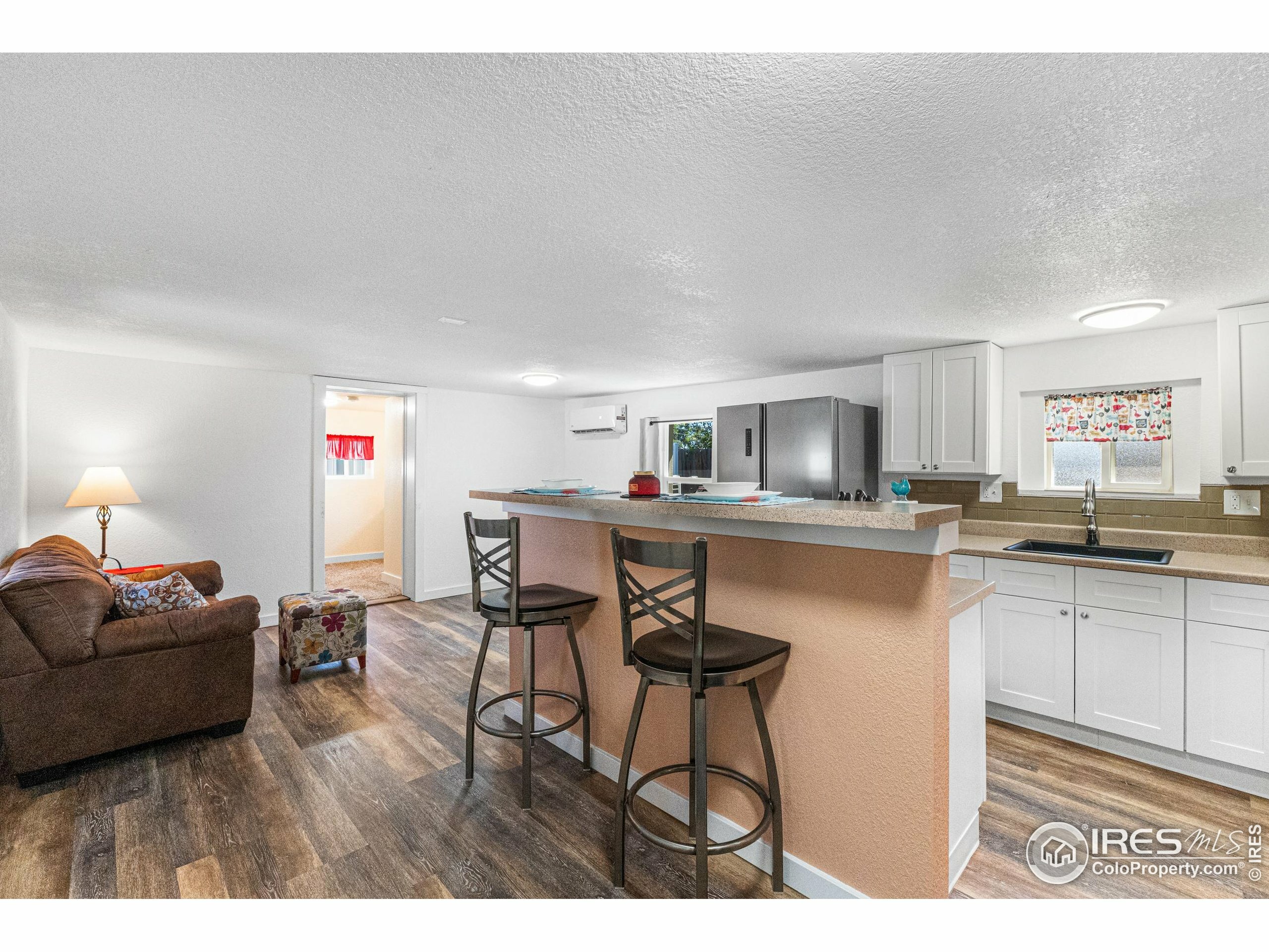 Property Photo:  3702 Valmont Ave  CO 80620 