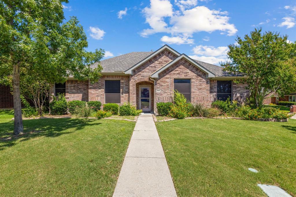 Property Photo: 100 Wooded Creek Avenue TX 75098