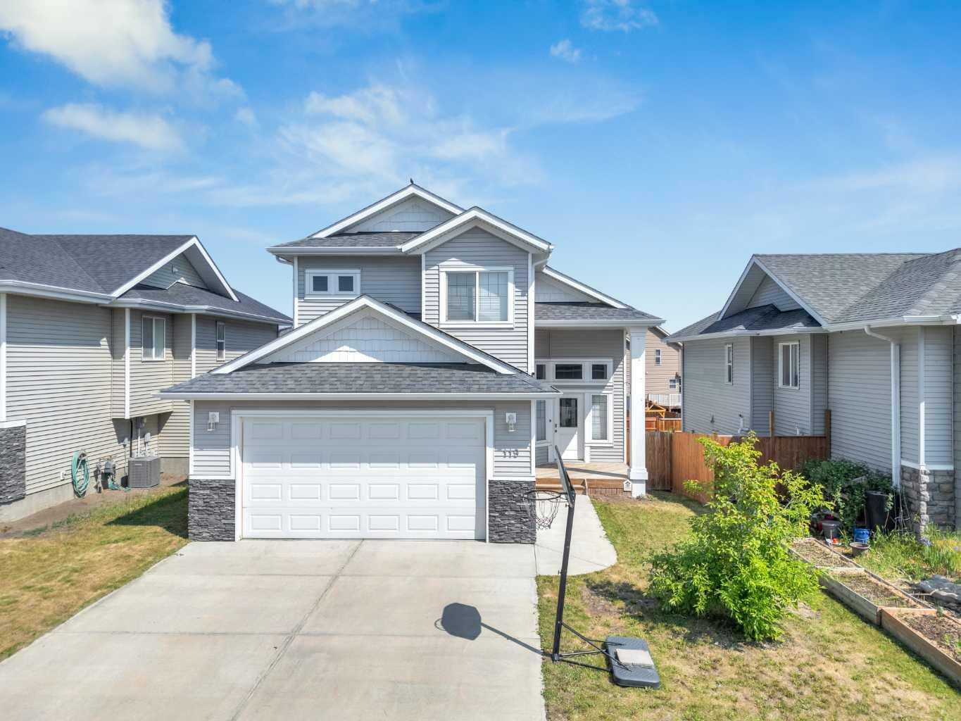 Property Photo: 119 Mitchell Crescent AB T4M 0H6