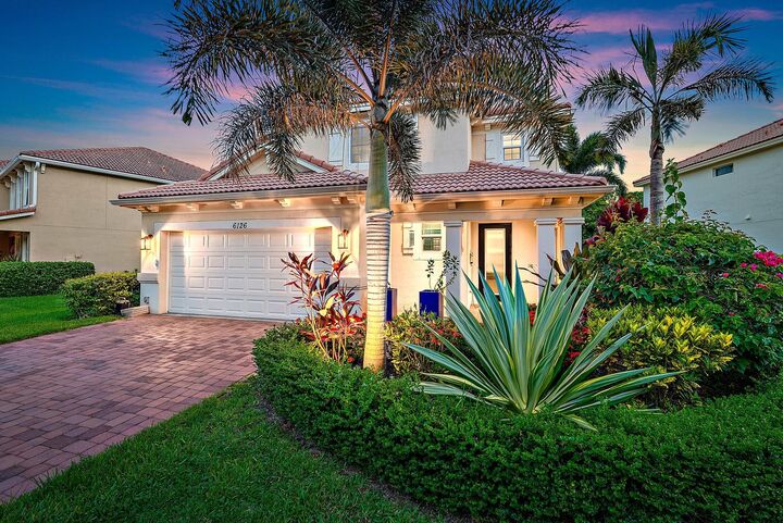 Property Photo: 6126 SE Split Oak Trail FL 33455