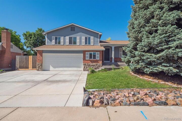 Property Photo: 9442 W Walden Avenue CO 80128