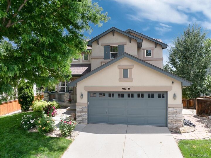 Property Photo: 9610 S Dover Way CO 80127