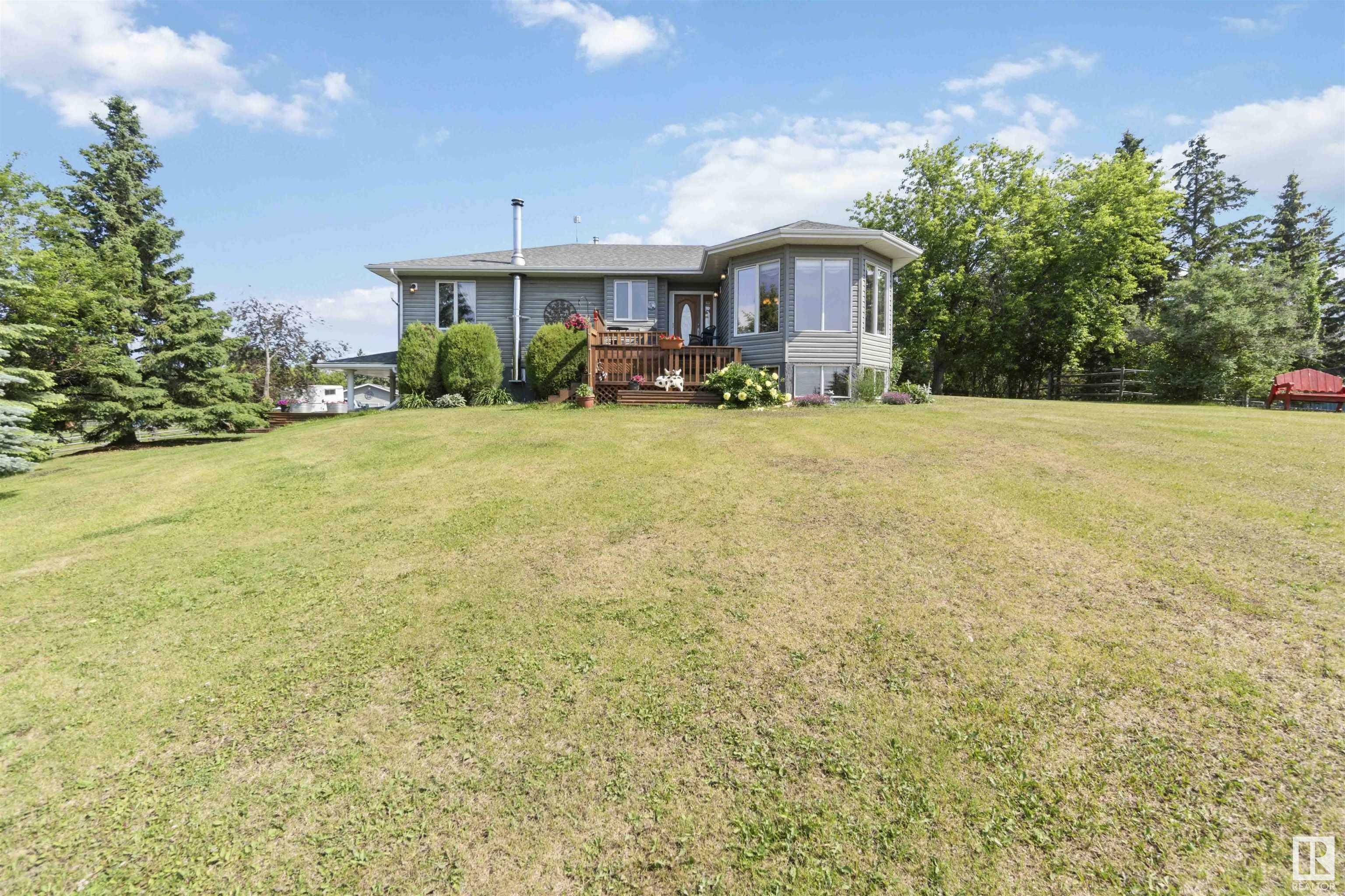 Property Photo: 1103 Twp Road 540 128 AB T7Z 1X3