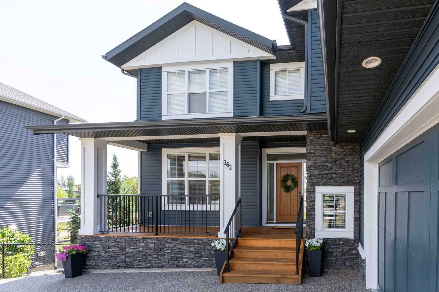 Property Photo: 162 Canoe Crescent SW AB T4B 2N9