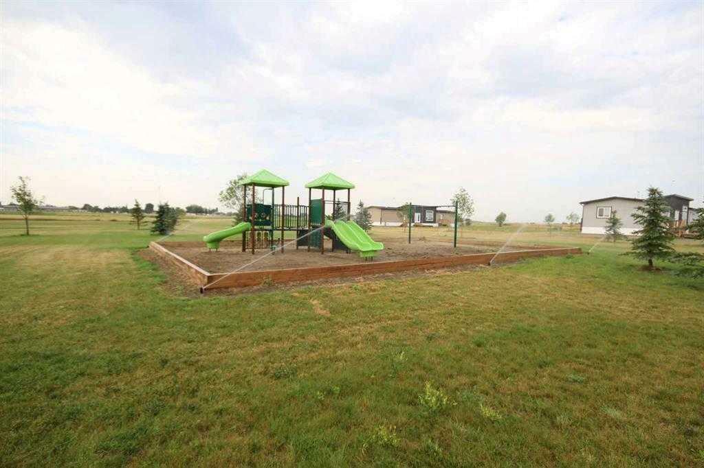Photo de la propriété: 6 Meadows Way AB T1G 2A2