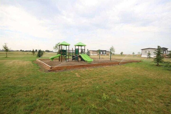 Photo de la propriété:  6 Meadows Way  AB T1G 2A2 
