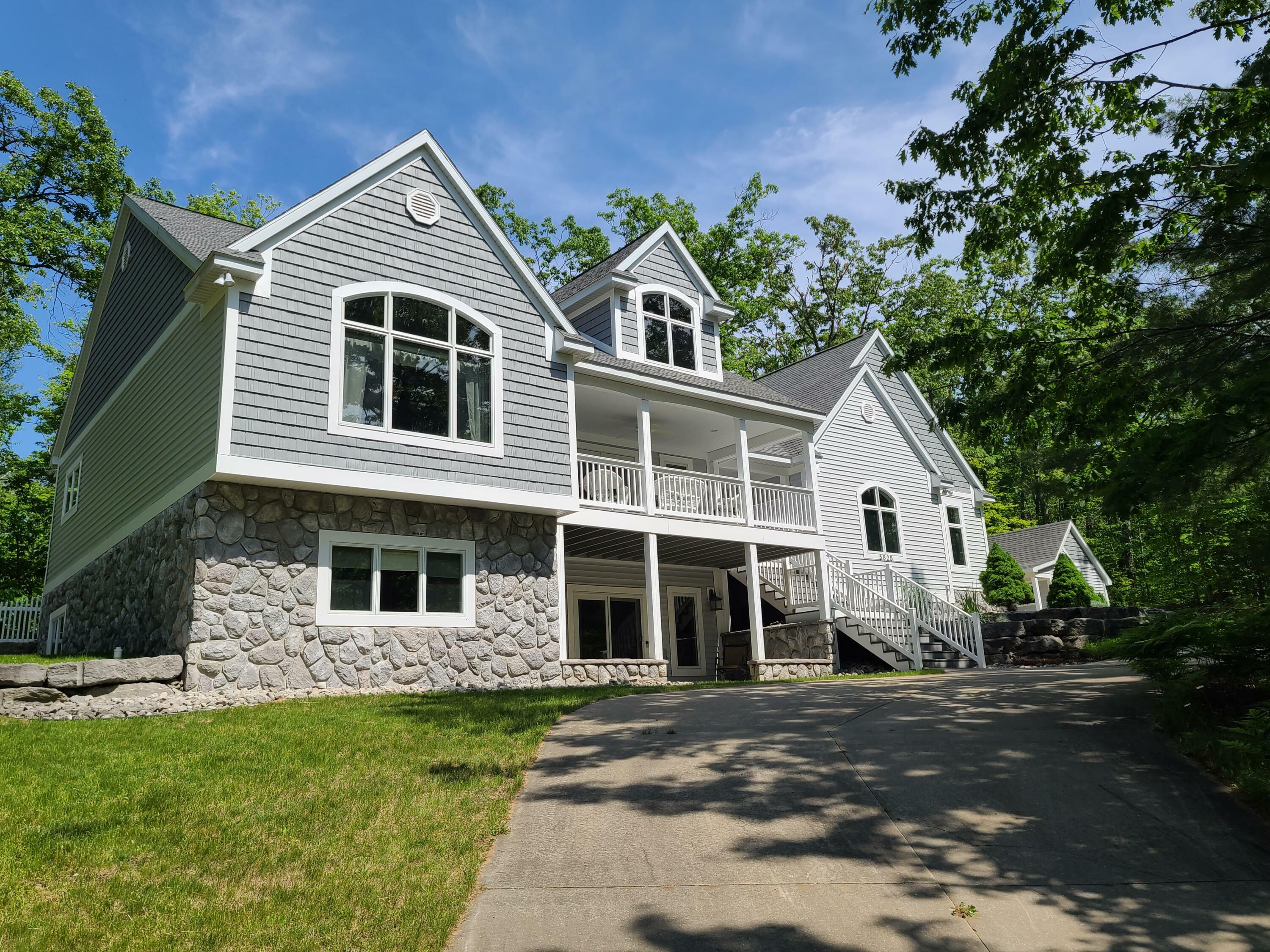 Property Photo:  5825 Arawak Pass  MI 49735 
