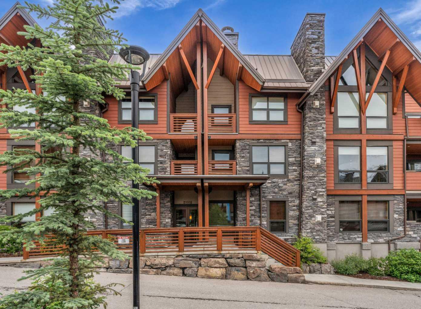 Property Photo:  2100B Stewart Creek Drive 201  AB T1W 0G3 